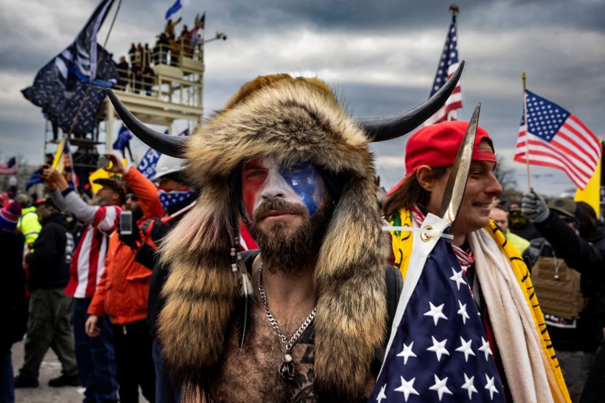 18clt1-jacob-anthony-angeli-chansley-known-as-the-qanon-shaman-is-seen-at-the-capital-riots-getty